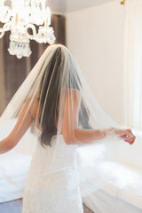 ELIZA BRIDAL TULLE AND FRENCH LACE FINGERTIP VEIL IN IVORY