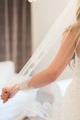 ELIZA BRIDAL TULLE AND FRENCH LACE FINGERTIP VEIL IN IVORY